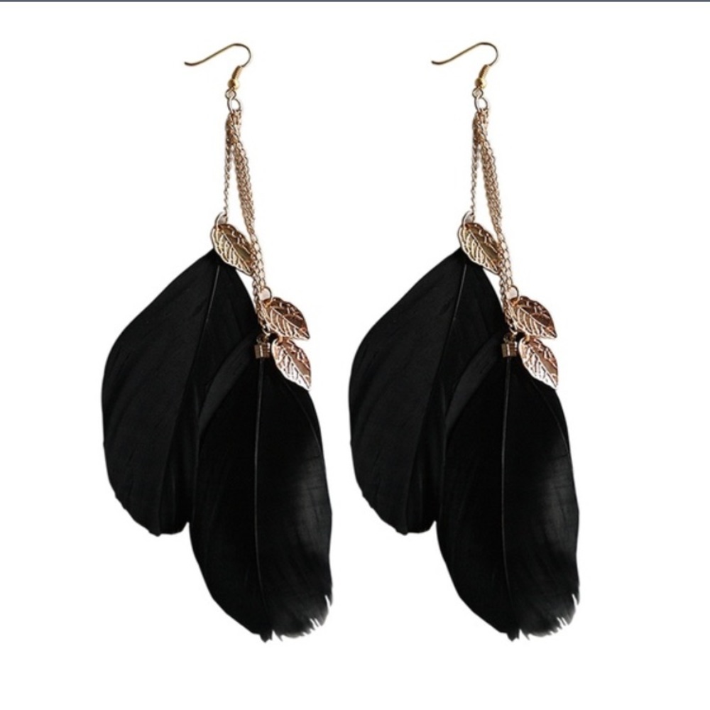 3/$30 last one! Black fun feathered earrings!